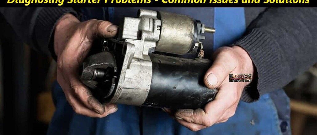 Mechanic Holding Old Car Starter Motor