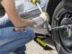 Removing Wheel Bolts On Car Tire