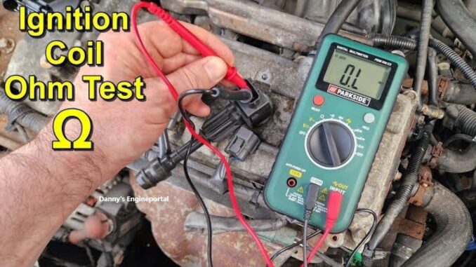 Testing ignition coil with multimeter.