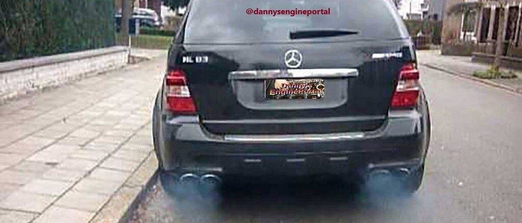 Blue Smoke Coming Out Of Exhaust Pipe From Burning Oil