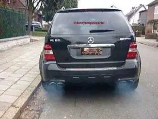 Blue Smoke Coming Out Of Exhaust Pipe From Burning Oil