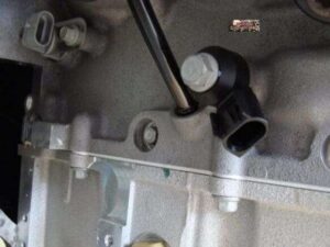 Knock Sensors (KS) Bolted To Engine Block