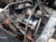 Car starter motor on engine