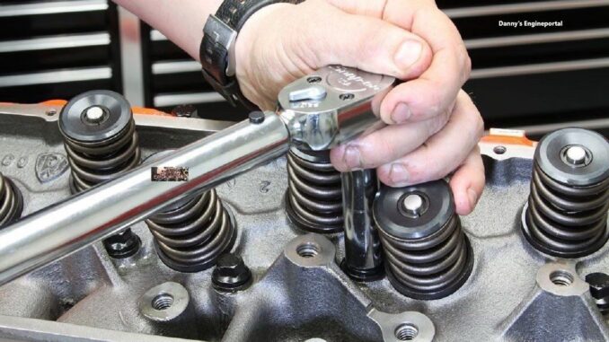 Using torque wrench to torque head bolts