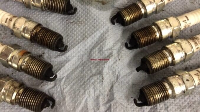 Wet Spark Plugs Causing Engine Misfires