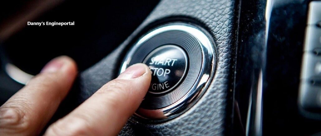 pressing start stop button in car