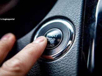 pressing start stop button in car